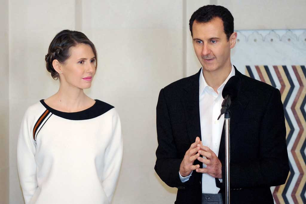 Assad berusia 55 tahun dan istrinya 10 tahun lebih muda darinya. Hasil tes positif mereka datang lebih dari seminggu setelah Suriah mulai memvaksinasi petugas kesehatan garis depan dengan menggunakan vaksin yang dikirim dari 'negara sahabat' yang tidak dikenal.