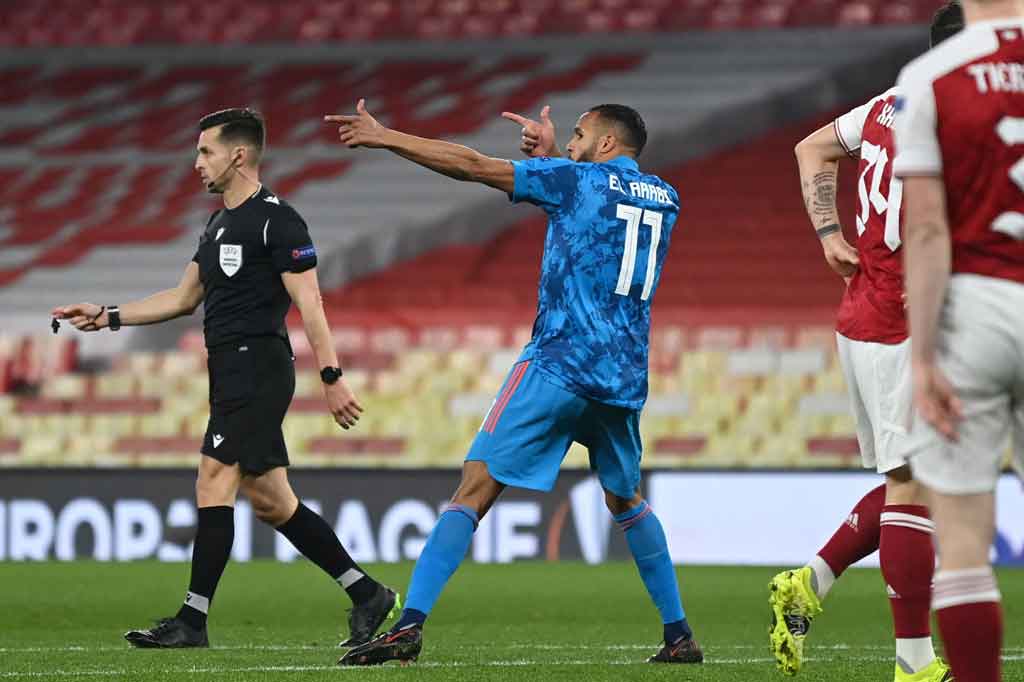 Youssef El Arabi melakukan selebrasi usai menjebol gawang tuan rumah.