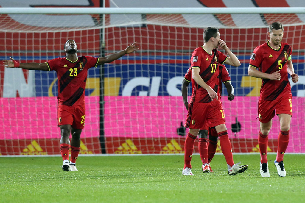 Michy Batshuayi membawa Belgia memimpin pada menit ke-14  menyelesaikan umpan Jeremy Doku.