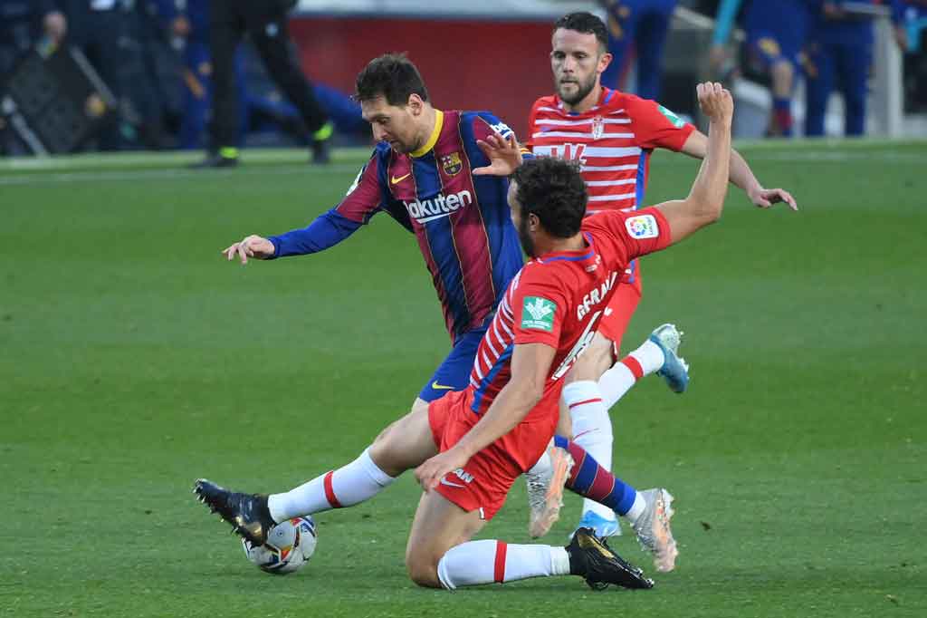 Kendati memegang kendali sejak awal laga, Barca kesulitan menembus pertahanan solid yang diperlihatkan Granada.