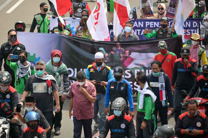 KSPI menggelar aksi untuk memprotes serangan militer Israel ke penduduk sipil Palestina serta tindakan kekerasan yang dilakukan Israel pada warga Muslim yang sedang beribadah di Masjid Al Aqsa pada bulan Ramadan.