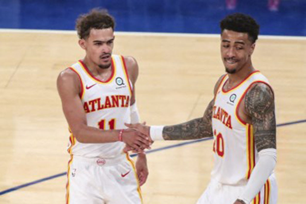 Trae Young mencetak 36 poin saat Atlanta Hawks menumbangkan tuan rumah New York Knicks dengan skor 103-89 pada gim kelima babak playoff NBA Wilayah Timur, Kamis, 3 Juni 2021. Unggulan kelima Hawks selanjutnya akan menghadapi unggulan teratas Philadelphia 76ers pada babak semifinal Wilayah Timur yang dimulai Minggu, 6 Juni 2021.