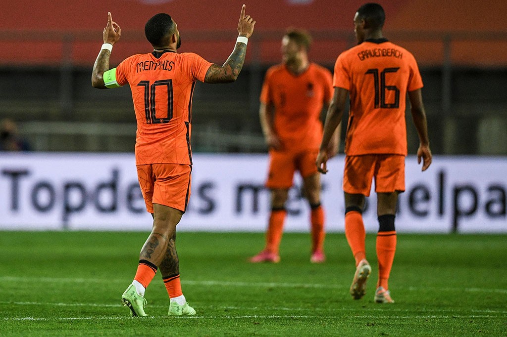 Gol Memphis Depay semenit menjelang pertandingan usai berhasil menyelamatkan timnas Belanda dari kekalahan dan memaksa hasil imbang 2-2 melawan Skotlandia dalam laga persahabatan menjelang Piala Eropa 2020 di Estadio Algarve, Faro, Kamis, 3 Juni 2021 dini hari WIB.