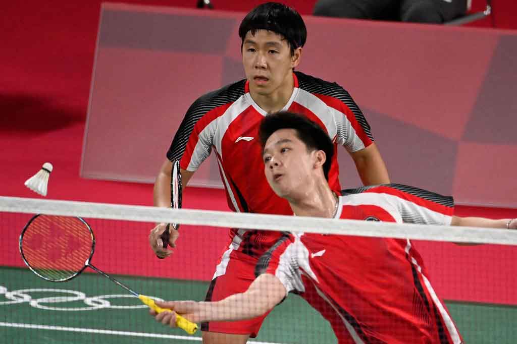 Ganda putra Indonesia Kevin Sanjaya Sukamuljo/Marcus Fernaldi Gideon mengemas kemenangan dua gim langsung atas wakil Inggris Ben Lane/Sean Vendy di babak penyisihan Grup A Bulu Tangkis Olimpiade Tokyo, Sabtu, 24 Juli 2021.