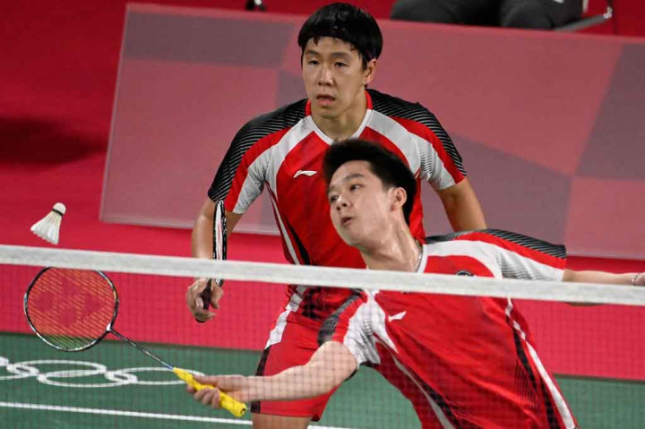 Ganda putra Indonesia Kevin Sanjaya Sukamuljo/Marcus Fernaldi Gideon mengemas kemenangan dua gim langsung atas wakil Inggris Ben Lane/Sean Vendy di babak penyisihan Grup A Bulu Tangkis Olimpiade Tokyo, Sabtu, 24 Juli 2021.