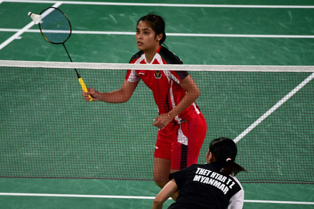 Gregoria Mariska Tunjung meraih kemenangan dua gim langsung atas wakil Myanmar Thet Htar Thuzar  dalam pertandingan yang berlangsung di Musashino Forest Sport Plaza, Jepang, Minggu, 25 Juli 2021.