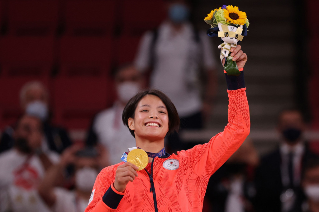 Uta menjadi Abe bersaudara pertama yang berhasil merebut medali emas. 