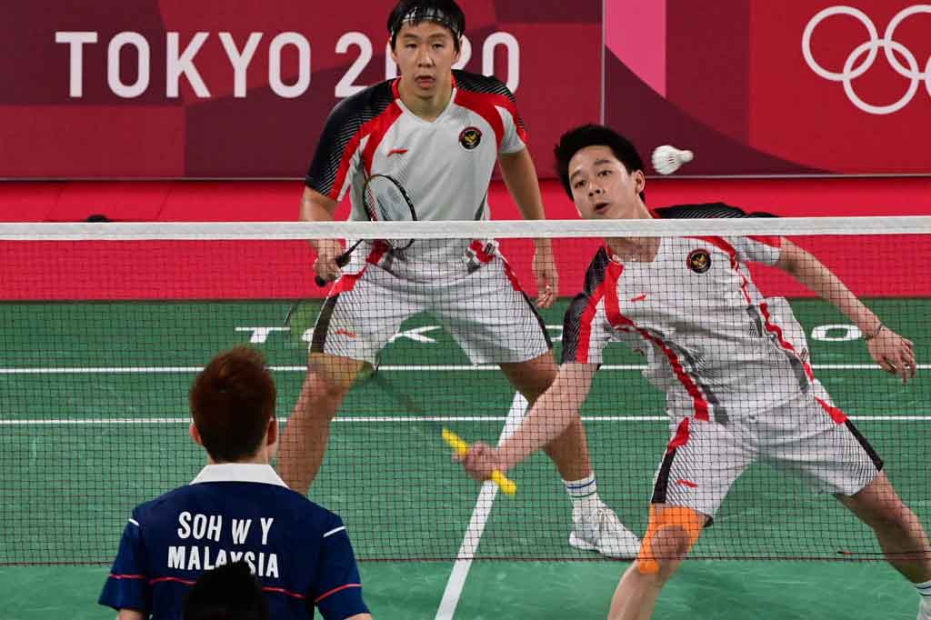 Bertanding di  Court 2 Musashino Forest Sport Plaza, Kamis, 29 Juli 2021 pagi WIB, Minions kalah dua gim langsung dari Soh Wooi Yik-Aaron Chia dengan skor 14-21 dan 17-21.