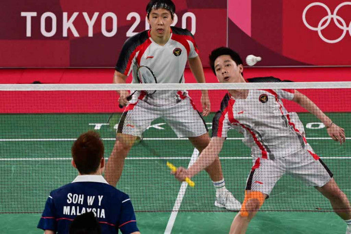 Bertanding di  Court 2 Musashino Forest Sport Plaza, Kamis, 29 Juli 2021 pagi WIB, Minions kalah dua gim langsung dari Soh Wooi Yik-Aaron Chia dengan skor 14-21 dan 17-21.