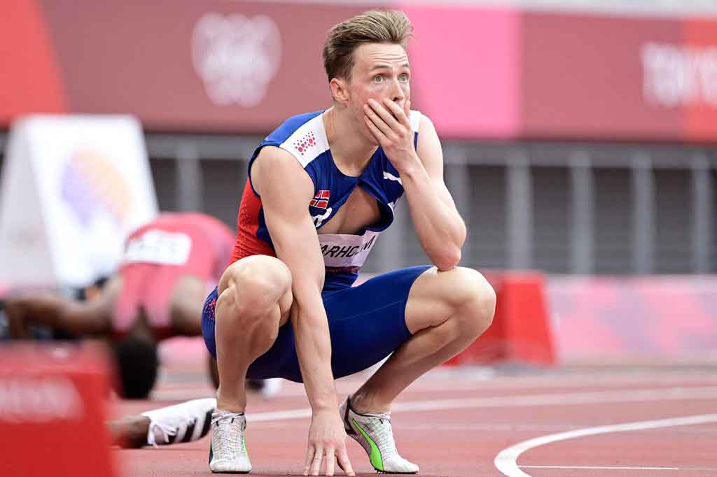 Ekspresi Warholm usai memecahkan rekornya sendiri.