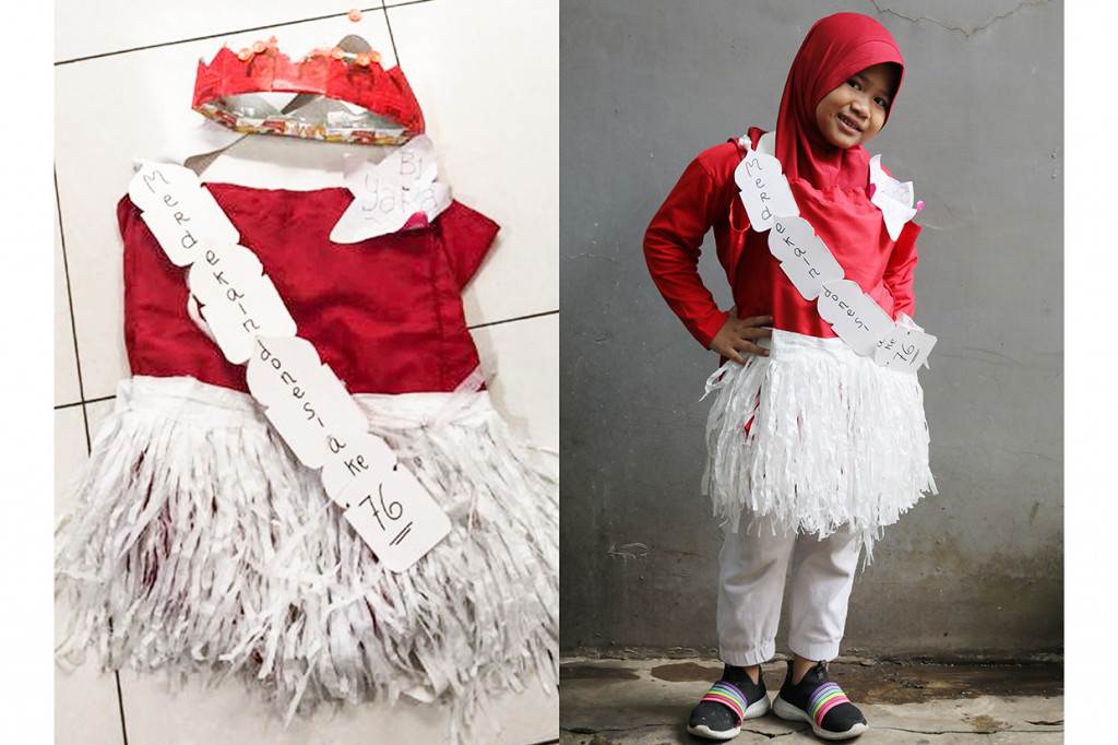 Khayyara Imara (6), Busana kreasi dari kertas bekas. 