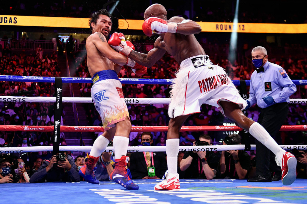 Yordenis Ugas berhasil mengalahkan Manny Pacquiao dalam duel perebutan gelar juara dunia tinju kelas welter (super) WBA.