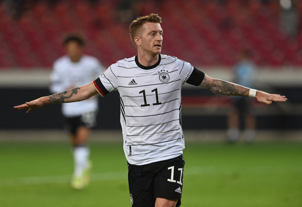 Marco Reus melakukan selebrasi usai mencetak gol ke gawang Armenia dalam lanjutan Kualifikasi Piala Dunia 2022.