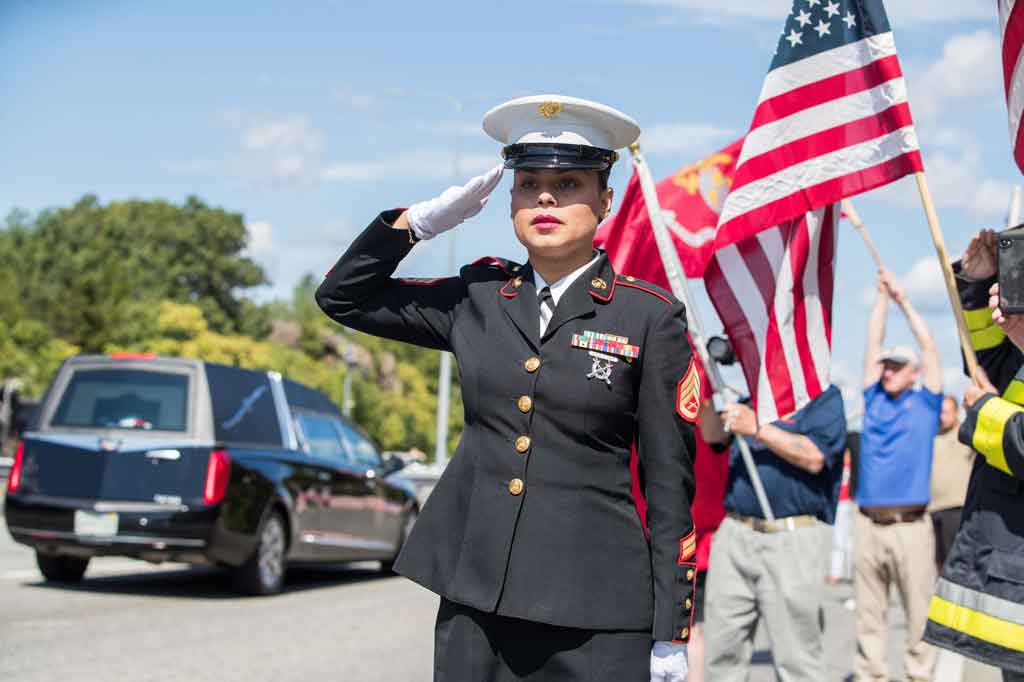Sersan Marinir AS Johanny Rosario kembali ke kampung halamannya di Massachusetts dalam peti mati pada Sabtu, 11 September 2021. Rosario merupakan salah satu tentara Amerika terakhir yang tewas di Afghanistan selama perang yang dimulai tepat dua dekade lalu oleh serangan 11 September 2001.