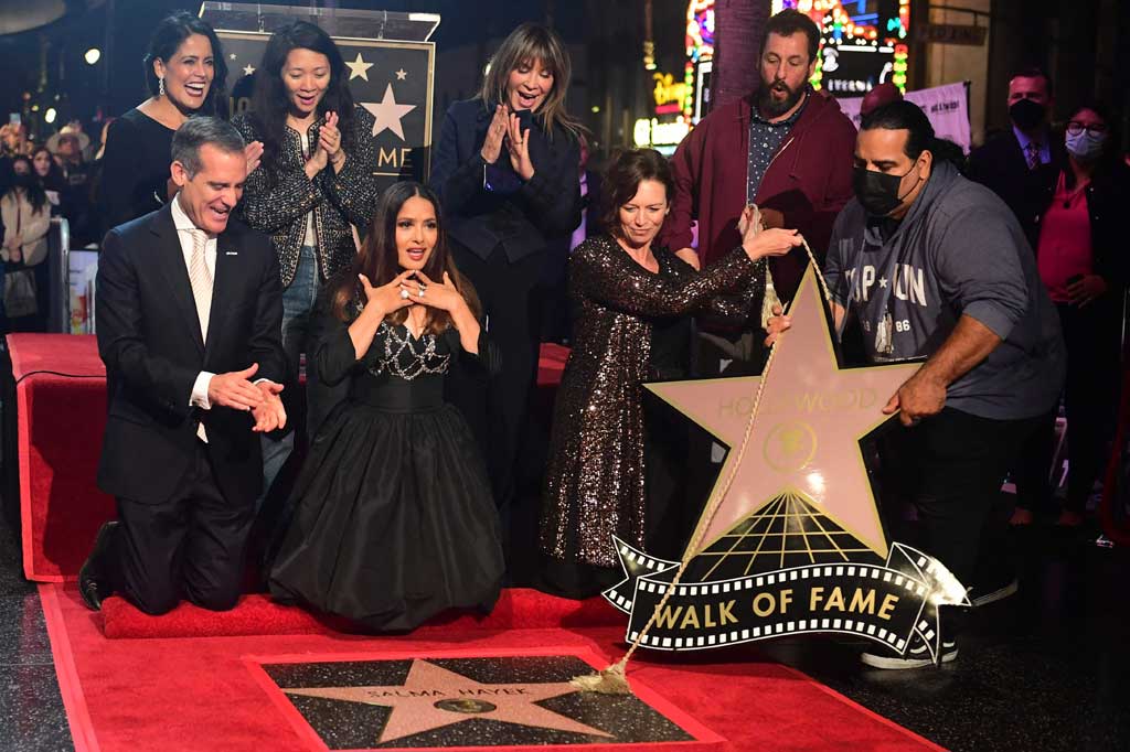 Wali Kota Los Angeles Eric Garcetti, Adam Sandler dan sutradara pemenang Oscar Chloe Zhao bergabung dengan Hayek pada upacara yang digelar di depan box office TCL Chinese Theatre Hollywood IMAX.
