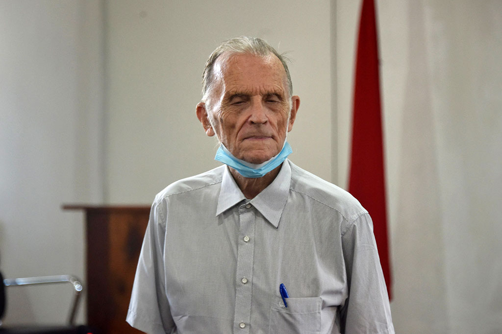 Sebuah panel hakim memutuskan mantan pastor itu bersalah atas beberapa kejahatan seks di tempat penampungan, yang didirikan pada awal 1990-an dan menampung ratusan anak yatim dan anak-anak miskin. Mereka menjatuhkan beberapa hukuman total 37 tahun di balik jeruji besi, tetapi hakim ketua Yudi Pamungkas mengatakan vonis itu dikurangi mengingat usianya.