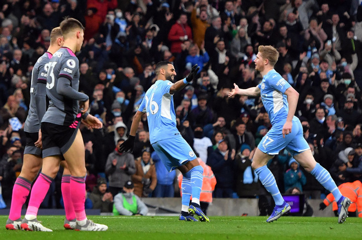 Manchester City berhasil memenangi drama sembilan gol kontra Leicester City pada pekan ke-19 Premier League, kasta tertinggi Liga Inggris, musim 2021-2022.