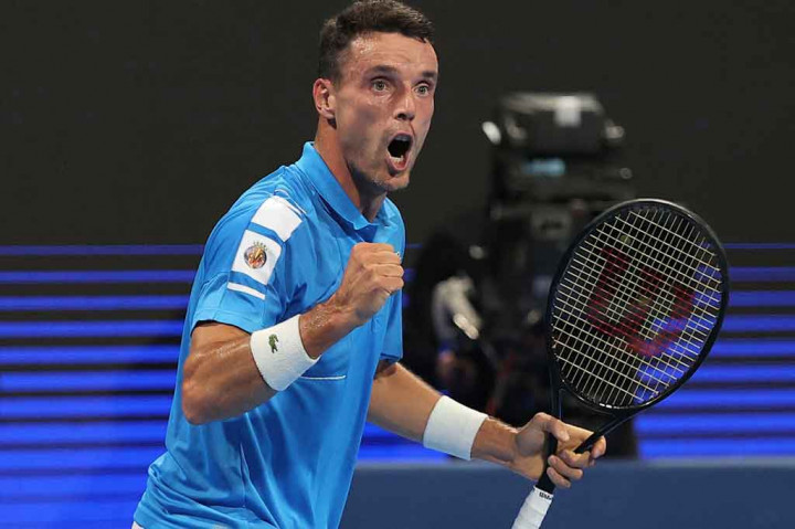 Petenis Spanyol Roberto Bautista Agut menatap putaran final Qatar Open untuk kedua kalinya secara berturut-turut, Jumat, 18 Februari 2022 waktu setempat. Di partai puncak, petenis Spanyol tersebut akan menghadapi juara bertahan Nikoloz Basilashivili.
