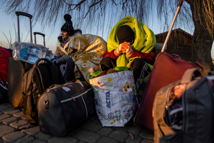 Kerusakan sistem komputer di sisi Ukraina disebut membuat para pengungsi harus menunggu lama untuk masuk ke Polandia.