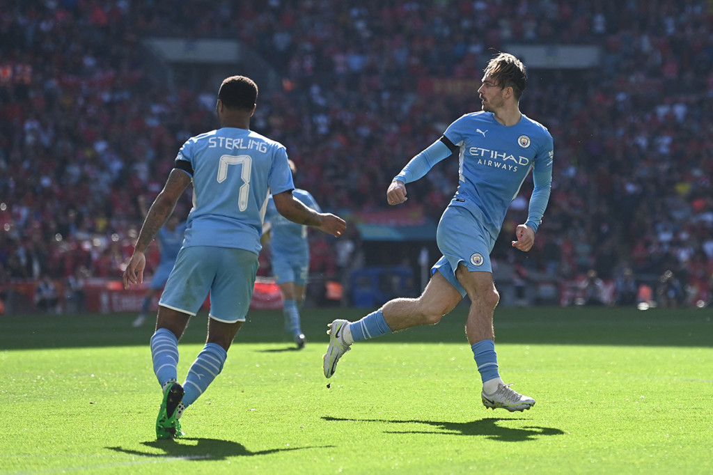 Jack Grealish melakukan selebrasi usai mencetak gol ke gawang Liverpool di babak semifinal.