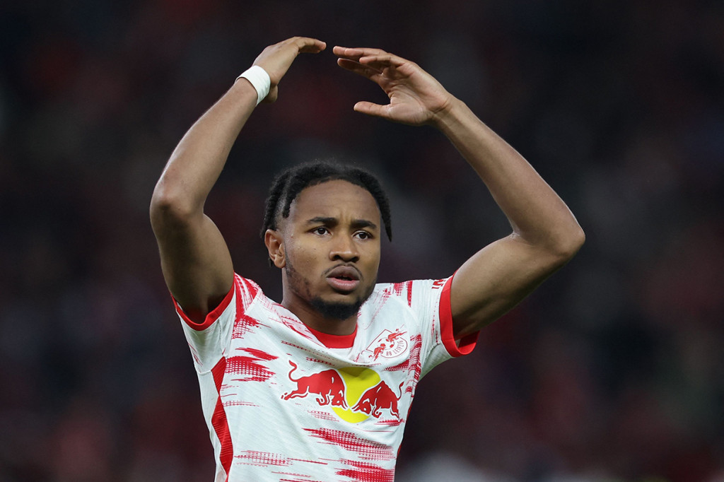 Christopher Nkunku melakukan selebrasi usai mencetak gol le gawang Freiburg.