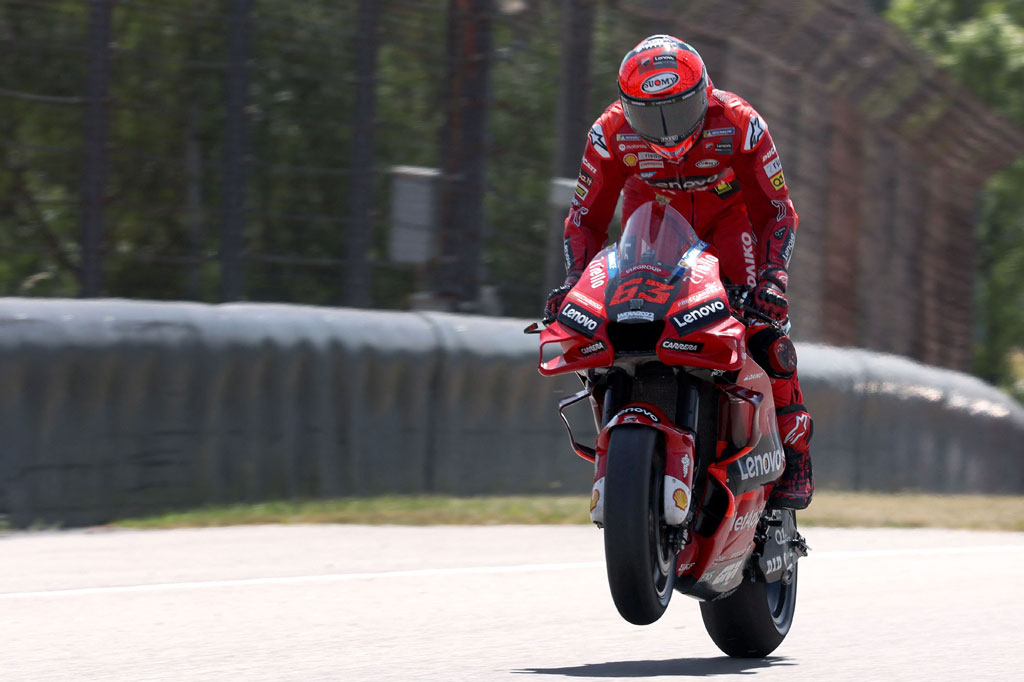 Pembalap Ducati Francesco Bagnaia melakukan selebrasi usai mengklaim pole position Grand Prix Jerman pada Sabtu, 18 Juni 2022.