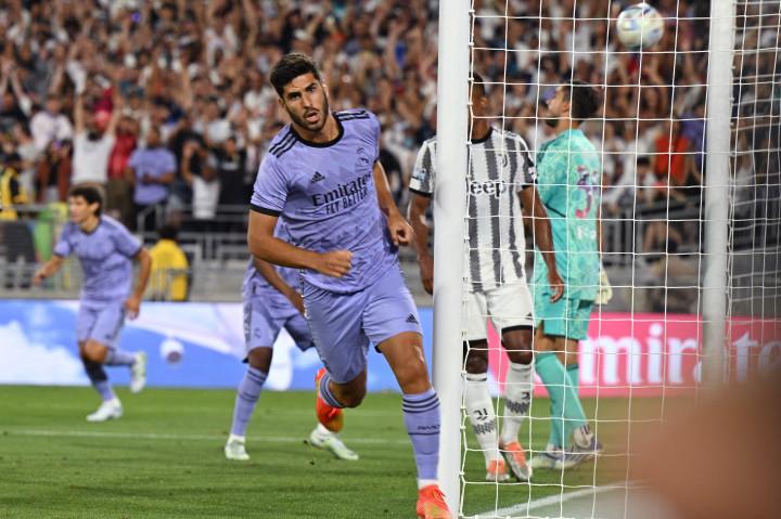 Marco Asensio melakukan selebrasi usai mencetak gol ke gawang Real Madrid.
