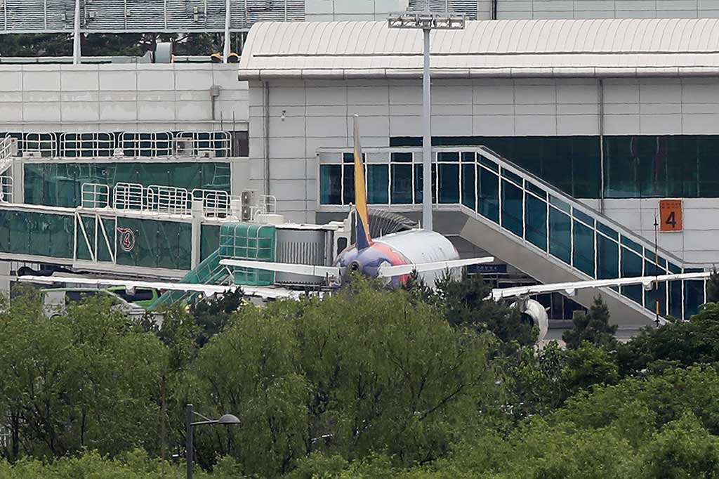 Airbus A321-200 membawa hampir 200 penumpang saat mendekati landasan pacu di Bandara Internasional Daegu, sekitar 240 kilometer (149 mil) tenggara Seoul, dalam penerbangan domestik.