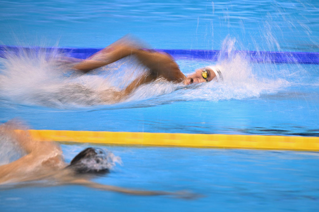 Atlet Tunisia Ahmed Hafnaoui memenangkan gelar gaya bebas 1.500m putra di kejuaraan dunia renang pada hari Minggu, 30 Juli 2023.
