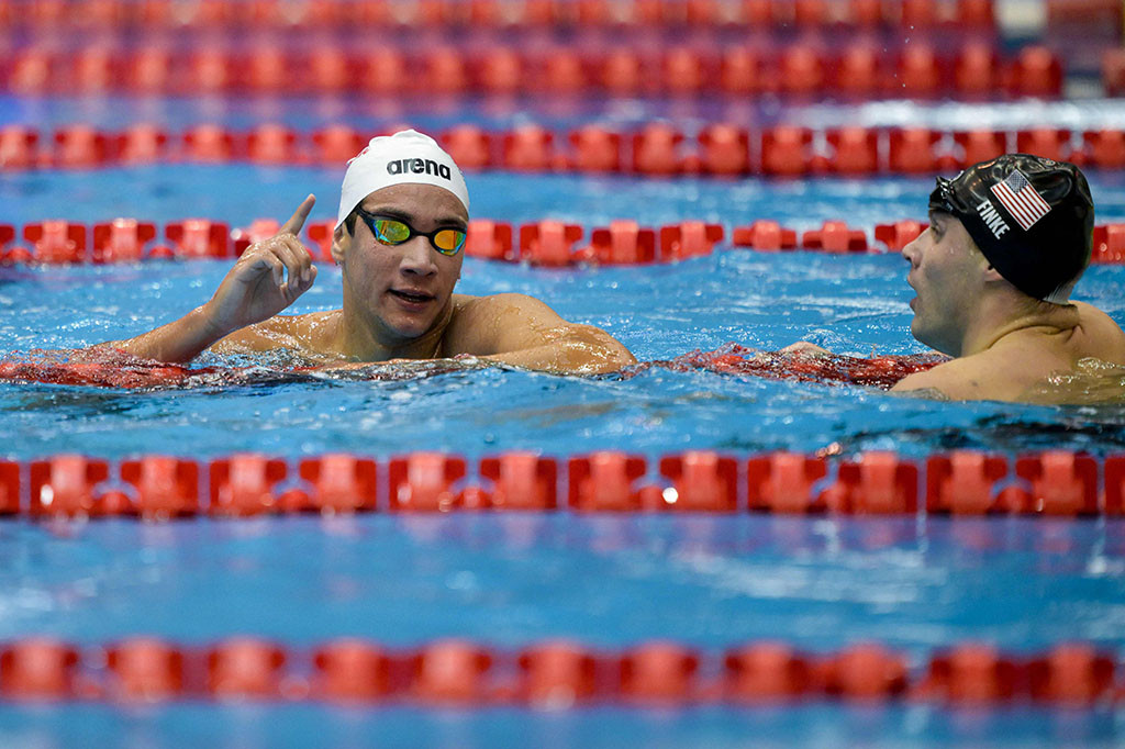 Waktu Hafnaoui kurang dari satu detik dari rekor dunia 14:31,02 yang dibuat oleh Sun Yang dari China pada tahun 2012.