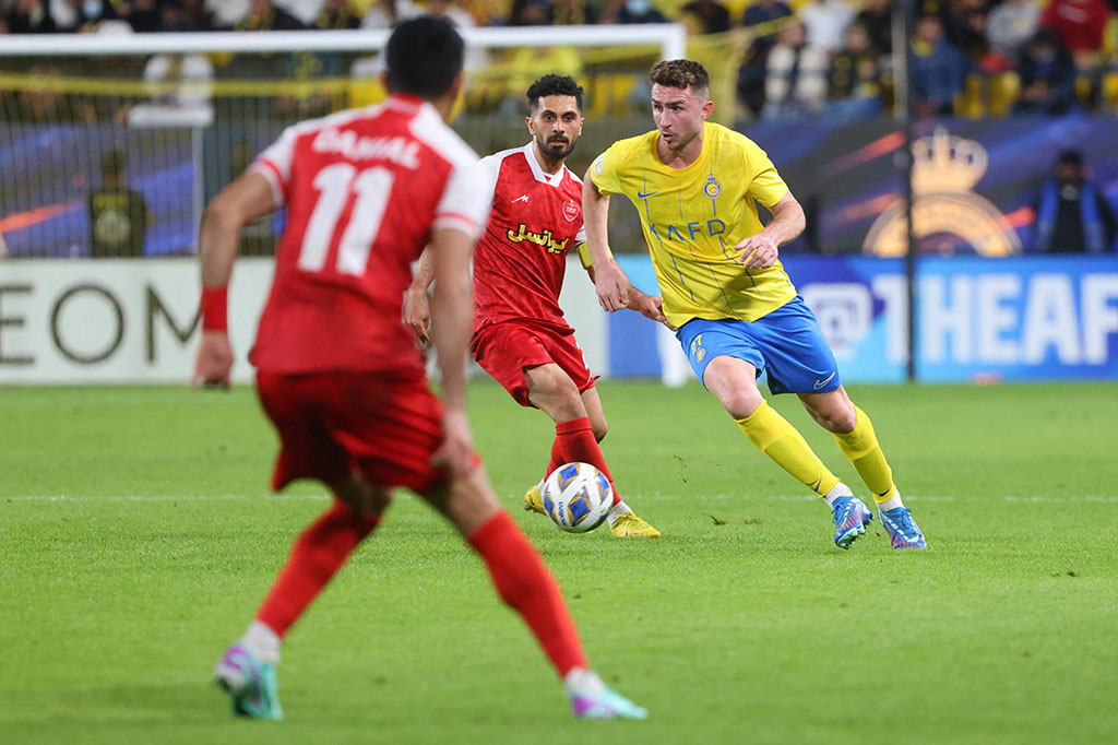 Al Nassr yang diperkuat Cristiano Ronaldo membukukan tempat mereka di babak sistem gugur Liga Champions Asia, Senin, 27 November 2023, usai meraih hasil imbang 0-0 di kandang melawan Persepolis dari Iran.