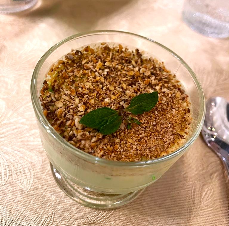 Tape Ijo Panna Cotta

Tape ijo dengan Panna Cotta bertekstur lembut dan ringan. Disajikan dengan granola dan coklat putih almond. 

Sajian ini cocok sebagai hidangan penutup. Olahan tape ijo sudah menjadi hidangan favorit bagi keluarga Mangkunegaran sejak dahulu dan menjadi hidangan favorit K.G.P.A.A Mangkoenagoro VII.