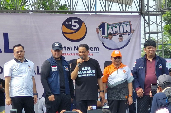 Calon presiden nomor urut 1, Anies Baswedan melakukan kampanye akbar di lapangan Pinang, Kota Tangerang, Banten. Dalam orasinya, Anies berharap masyarakat Banten tidak hanya menjadi penonton dalam perubahan.   