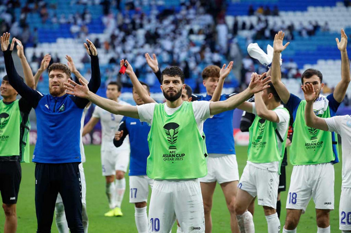 Para pemain Uzbekistan melakukan selebrasi usai memastikan diri melaju ke babak perempat final Piala Asia 2023, Selasa, 30 Januari 2024 malam WIB. Uzbekistan selanjutnya akan menghadapi tuan rumah dan juara bertahan Qatar setelah meraih kemenangan 2-1 atas Thailand.