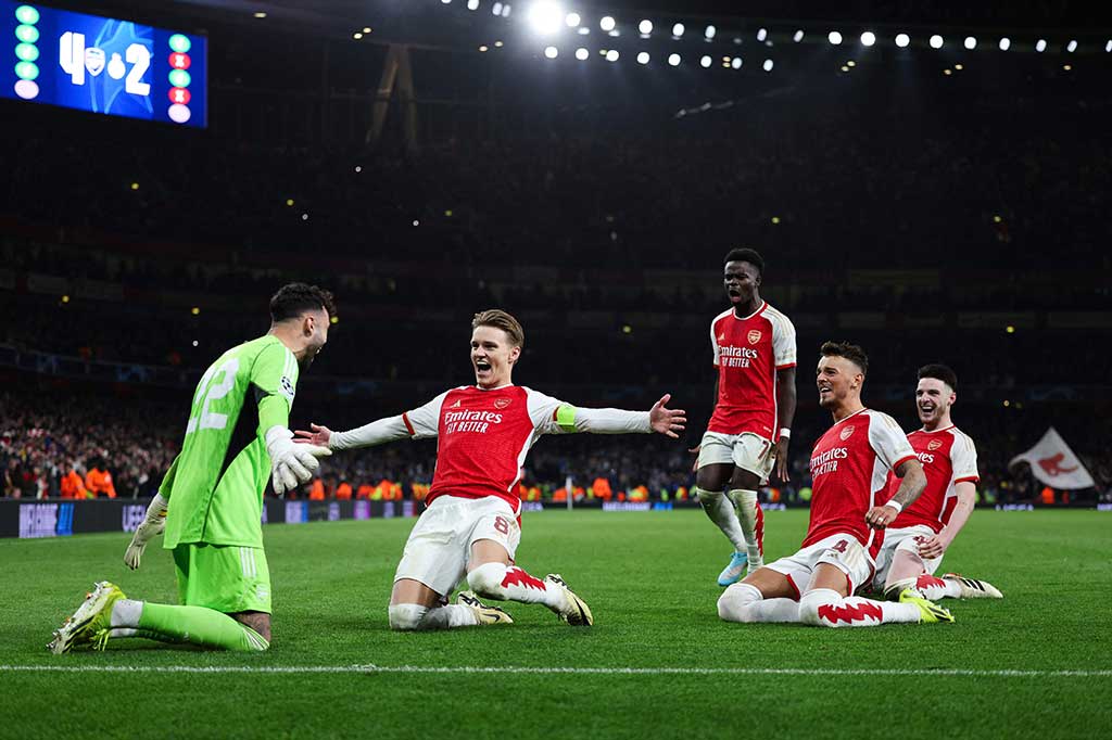 Arsenal mengamankan tiket ke delapan besar atau perempat final Liga Champions 2023/24 setelah menang adu penalti 4-2 atas Porto di laga leg kedua babak 16 besar di Stadion Emirates pada Rabu, 13 Maret 2024 dini hari WIB. 