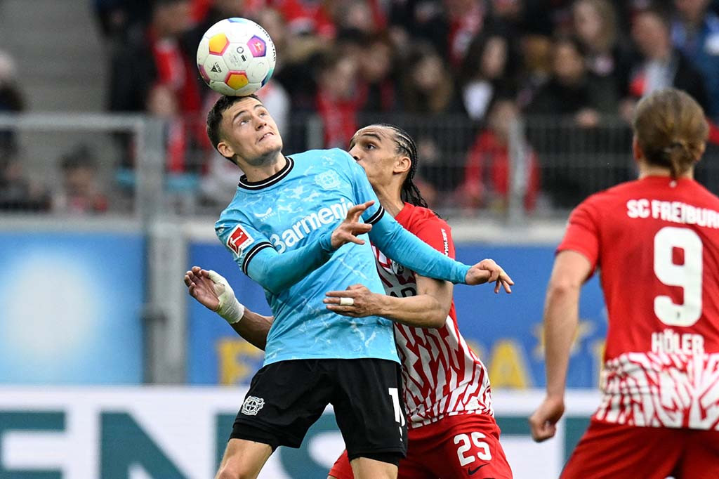 Bayer Leverkusen memetik kemenangan di kandang SC Freiburg dengan skor 3-2 dalam pertandingan pekan ke-26 Liga Jerman yang berlangsung di Europa-Park Stadion, Freiburg, Minggu, 17 Maret 2024 malam WIB.
