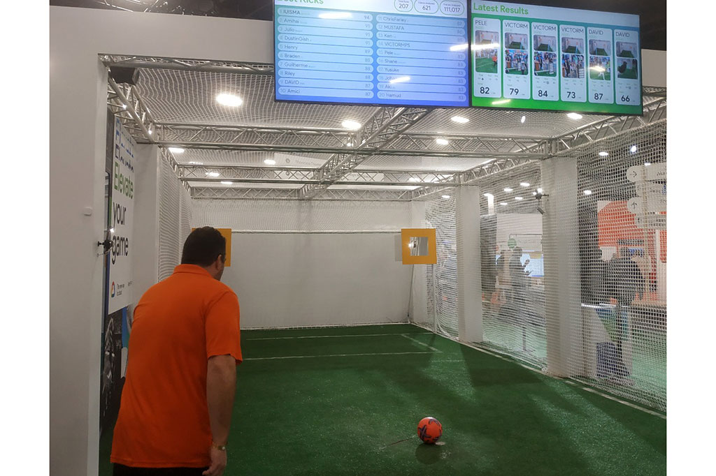 Demo Vertex AI Google Gemini & Imagen 2 dalam simulasi tendangan penalti sepakbola. Pengunjung yang menendang bola, akan mendapatkan analisis AI atas kekurangan, kelebihan, dan saran tendangan yang akurat. Terdapat serangkaian kamera dan alat pengukur kecepatan tendangan, yang akan dibaca oleh Vertex AI menjadi analisis suara dan teks, langsung bisa didengar dan dibaca oleh penendang bola usai melakukan aksinya.