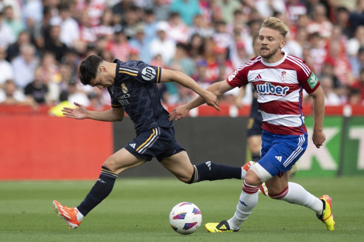 Real Madrid meraih kemenangan telak 4-0 saat bertandang ke markas Granada dalam lanjutan LaLiga 2023/24 di Estadi Nuevo Los Carmenes pada Sabtu, 11 Mei 2024 malam WIB.