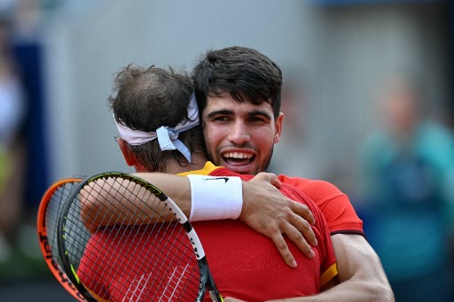 Pasangan Spanyol Rafael Nadal bersama Carlos Alcaraz melaju ke perempat final ganda putra di Olimpiade 2024 Paris, Selasa, 30 Juli 2024.