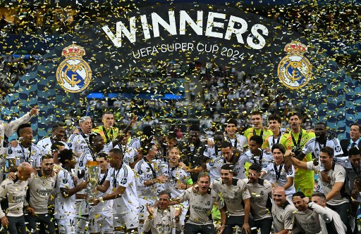 Real Madrid menjadi juara Piala Super Eropa 2024 setelah mengalahkan jawara Liga Europa, Atalanta dengan skor 2-0 di National Stadium Warsaw pada Kamis, 15 Agustus 2024 dini hari WIB. Para penggawa Los Blancos pun berselebrasi merayakan keberhasilan mereka.