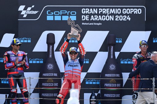 Di belakang Marquez secara berurutan diisi pembalap Prima Pramac Racing Jorge Martin dan Red Bull Gasgas Tech 3 Pedro Acosta yang mengamankan podium.