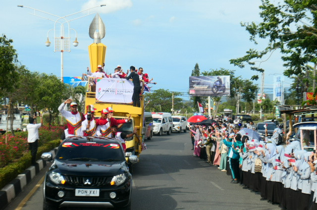 Kirab Api Pekan Olahraga Nasional (PON) XXI Aceh-Sumut akhirnya berlabuh di Kota Banda Aceh. Kota yang kaya sejarah ini akan menjadi tuan rumah pembukaan ajang olahraga terbesar di Indonesia tersebut pada 9 September 2024.