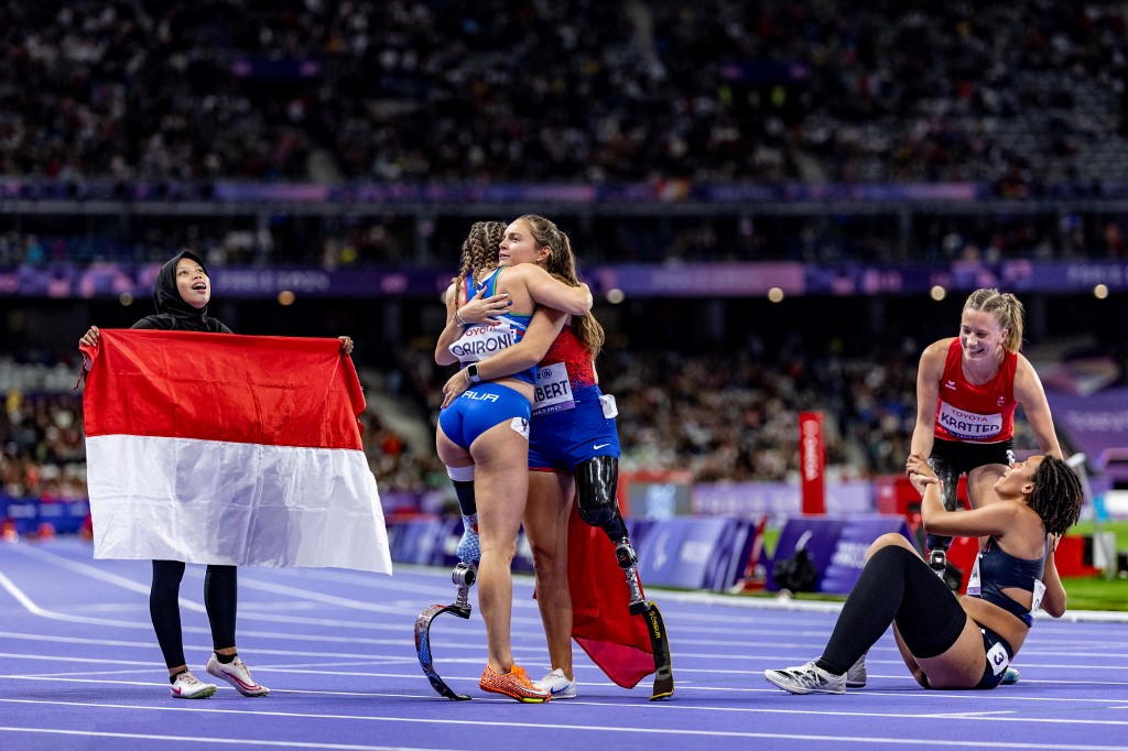 Pada perlombaan di Stade de France, Paris, Minggu, 8 September 2024 dini hari WIB, Karisma Evi yang sejatinya klasifikasi T42 turun di nomor T63.