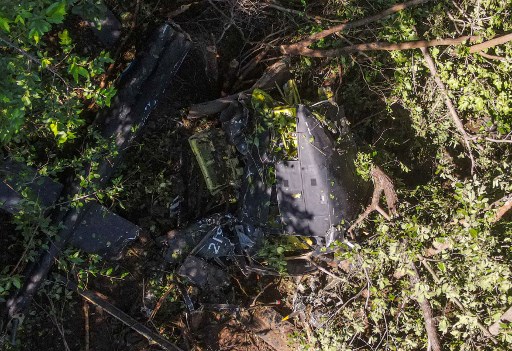Reruntuhan helikopter militer yang mengalami kecelakaan di Pasaquina, El Salvador, pada Senin, 9 September 2024.