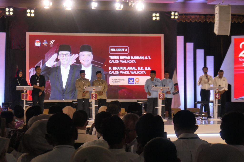 Dalam debat perdana calon wali kota dan wakil wali kota 2024, Teuku Irwan Djohan dan Khairul Amal, pasangan calon nomor urut 4, memperkenalkan visi mereka untuk Banda Aceh sebagai 'Kota KITA' (Kreatif, Islami, Terbuka, dan Amanah). Irwan menekankan pentingnya membangun kota yang modern dan religius, serta memastikan keadilan bagi seluruh warganya.