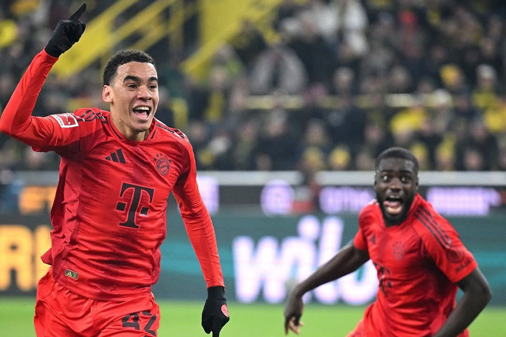Bayern Muenchen menahan imbang Borussia Dortmund 1-1 pada pekan ke-12 Liga Jerman di Stadion Signal Iduna Park, Dortmund, Minggu, 1 Desember 2024 dini hari WIB. Jamal Musiala sukses menyamakan kedudukan untuk Die Roten.