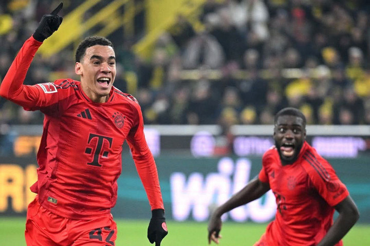 Bayern Muenchen menahan imbang Borussia Dortmund 1-1 pada pekan ke-12 Liga Jerman di Stadion Signal Iduna Park, Dortmund, Minggu, 1 Desember 2024 dini hari WIB. Jamal Musiala sukses menyamakan kedudukan untuk Die Roten.