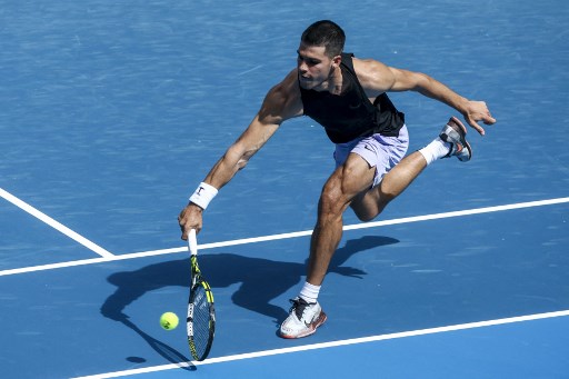 Meski kalah pada pertandingan amal melawan favorit tuan rumah, Alex de Minaur, Alcaraz berambisi menjadi petenis putra termuda yang menjuarai empat turnamen Grand Slam sepanjang kariernya, setelah mengoleksi trofi French Open, Wimbledon dan US Open.