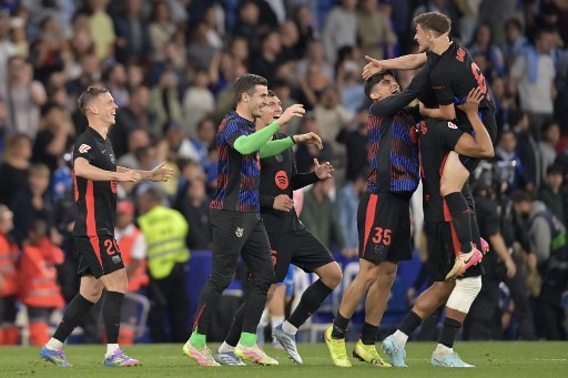 Gol spektakuler Lamine Yamal dan gol pemain pengganti Fermin Lopez memastikan Barcelona menjadi kampiun musim ini.