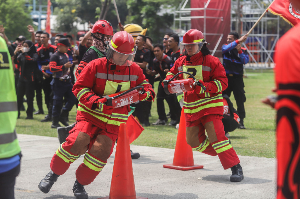 Sebanyak 1.456 anggota tim tanggap darurat dari 112 perusahaan dan 440 relawan dari 44 tim kecamatan ambil bagian dalam kompetisi ini. 